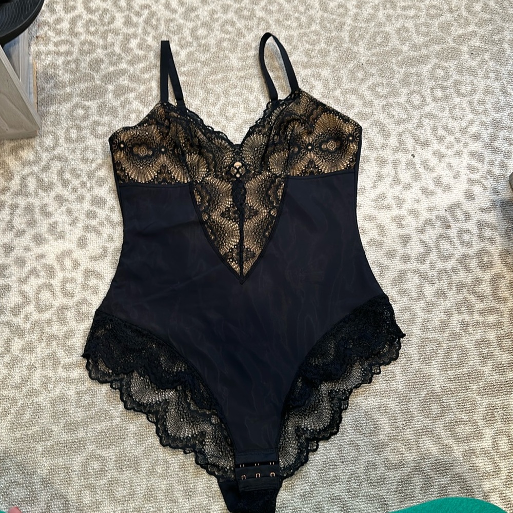 Pinsy lace bodysuit.